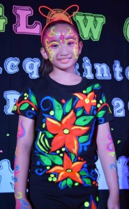 Sophia Sarreal of Year 6 brought the theme of GLOW to life with her neon costume and make-up. 
